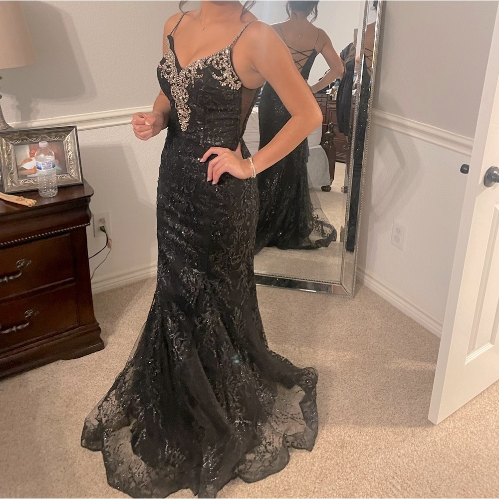 Black Prom Dress, bought from The Dress Shop.
Size XS, in beautiful condition.